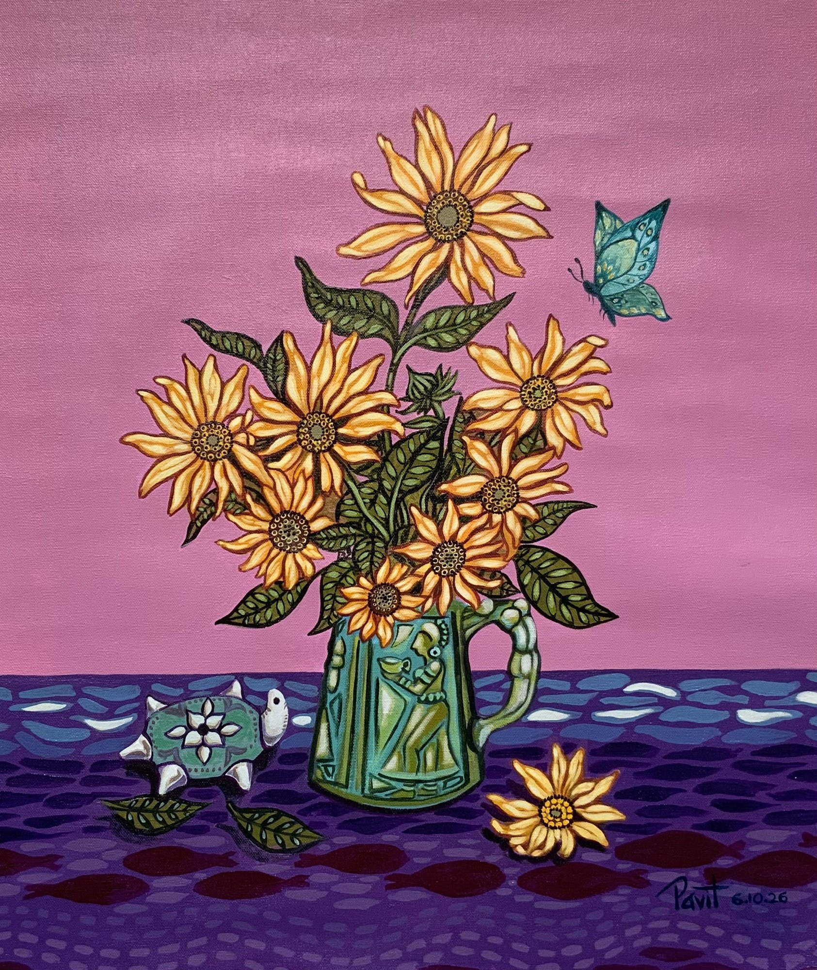 Sunflowers in a patterned green jug with a small turtle and butterfly.